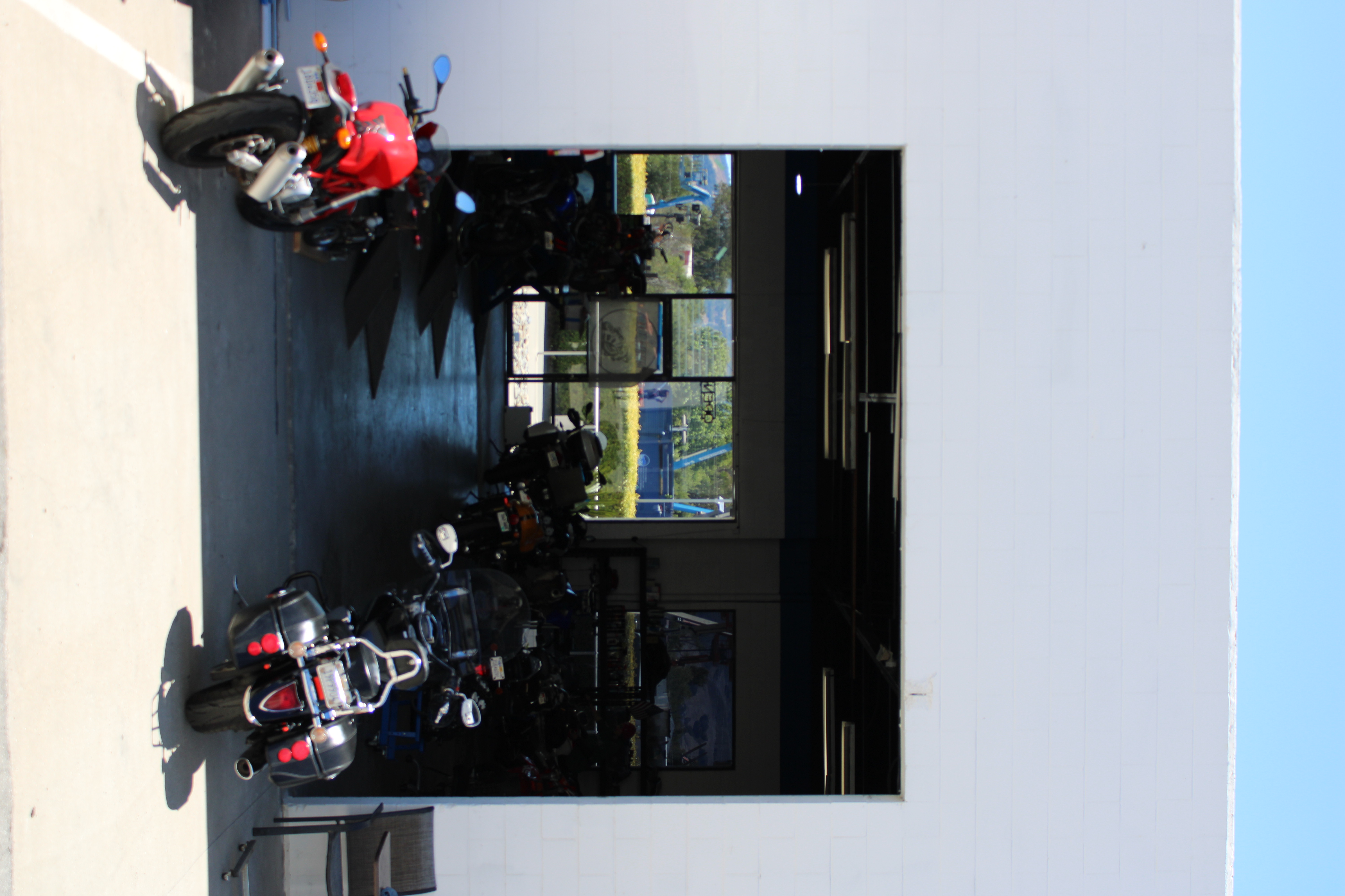 Motorcycle tires stored on a wall rack